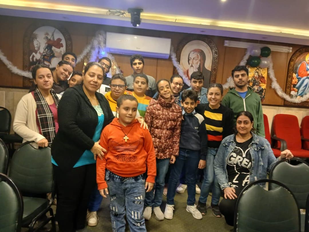 A group of children and staff participating in community programs